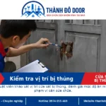 01 cua sat bi thung